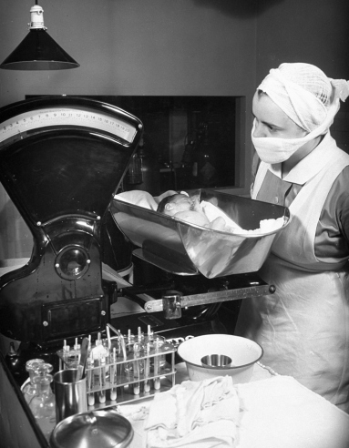 Hansel Mieth - The LIFE Picture Collection/Getty Images/Not published in LIFE. Nurse with premature baby, Boston, 1939.