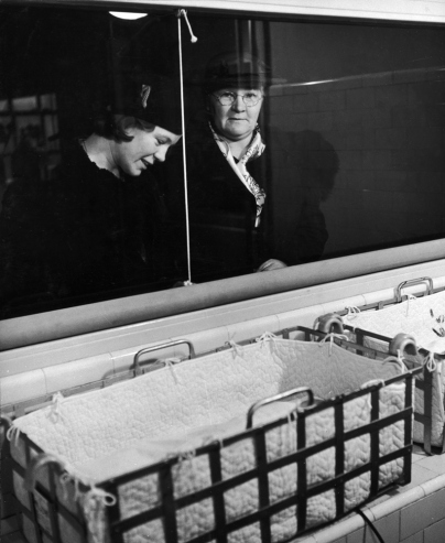 Hansel Mieth - The LIFE Picture Collection/Getty Images/Caption from LIFE. "Mothers of premature babies are never allowed inside the nursery, can spend one hour a day fondly gazing at their infants in their cots through a glass partition."