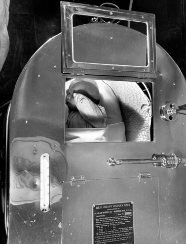 Hansel Mieth - The LIFE Picture Collection/Getty Images/Caption from LIFE. "The Hess bed is the premature baby's equivalent of an oxygen tent. Weak babies are placed in this container, given pure air and oxygen which facilitates breathing."